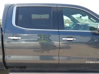 2019 GMC Sierra 1500 Denali z VIN 1GTU9FEL5KZ387012, wystawiony jako IAAI lot #42002743 z przebiegiem 124 718 mil mil oraz . Historia ofert i sprzedaży dostępna na DreamBid. Obrazek 13.