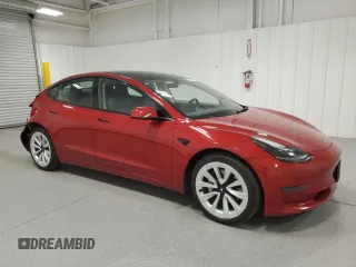 2023 Tesla Model 3 with VIN 5YJ3E1EA6PF455789, listed as a Copart auction lot 54715665 with 64,658 mi miles and Salvage Title. Bid and sale history available at DreamBid. Image 4.
