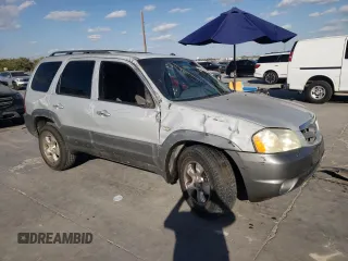 2002 Mazda Tribute LX with VIN 4F2YU09182KM64860, listed as a Copart auction lot 77391824 with 207,965 mi miles and Salvage Title. Bid and sale history available at DreamBid. Image 4.