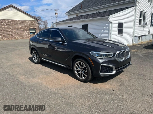 2021 BMW X6 xDrive40i z VIN 5UXCY6C02M9D88338, wystawiony jako Copart lot #50947775 z przebiegiem 116 477 mil mil oraz Czysty tytuł • Clean title. Historia ofert i sprzedaży dostępna na DreamBid. Obrazek 4.