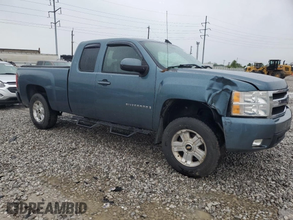 2007 Chevrolet Silverado 1500 1LT with VIN 1GCEK19J27E596422, listed as a Copart auction lot 56090475 with 199,260 mi miles and Salvage Title. Bid and sale history available at DreamBid. Image 4.