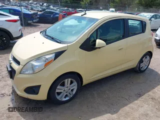 2013 Chevrolet Spark LT with VIN KL8CD6S99DC579079, listed as a IAAI auction lot 42090297 with 101,985 mi miles. Bid and sale history available at carsss.com. Image 2.