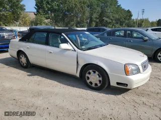 2001 Cadillac DeVille with VIN 1G6KD54YX1U158322, listed as a Copart auction lot 71097694 with 64,731 mi miles and Clean Title. Bid and sale history available at carsss.com. Image 4.