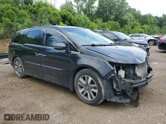 2015 Honda Odyssey Touring Elite with VIN 5FNRL5H9XFB058805, listed as a Copart auction lot 60433785 with 148,320 mi miles and Clean title. Bid and sale history available at DreamBid. Image 4.