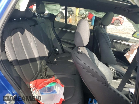 2017 BMW X1 xDrive28i with VIN WBXHT3C32H5F81460, listed as a Copart auction lot 55998515 with 123,853 mi miles and Salvage title. Bid and sale history available at DreamBid. Image 10.