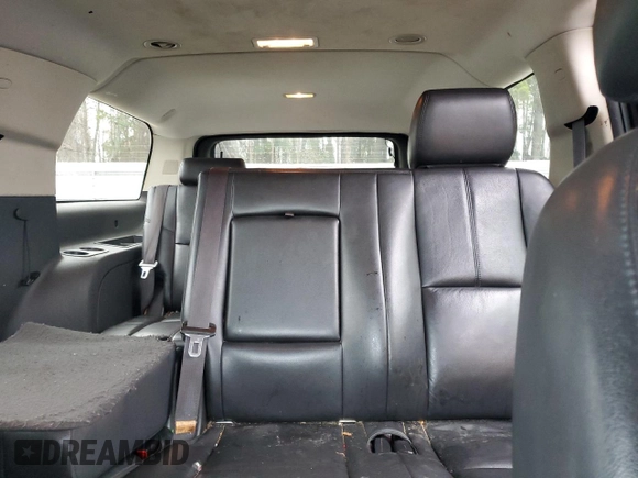 2014 Chevrolet Suburban LT with VIN 1GNSCJE05ER138819, listed as a Copart auction lot 43324175 with 218,114 mi miles and Salvage Title. Bid and sale history available at carsss.com. Image 10.
