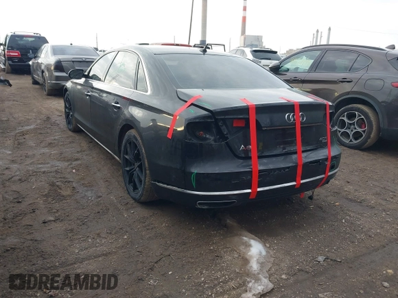 2015 Audi A8 L 4.0T with VIN WAU32AFD5FN026108, listed as a IAAI auction lot 41652860 with 148,253 mi miles. Bid and sale history available at carsss.com. Image 3.