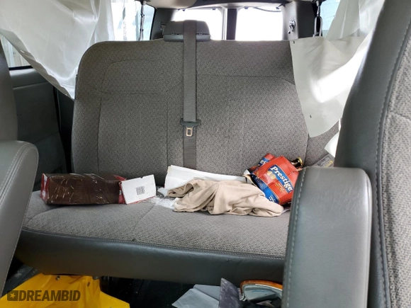 2012 Chevrolet Express Passenger 1LT with VIN 1GAZG1FG5C1183156, listed as a Copart auction lot 65655454 with 130,915 mi miles and Salvage Title. Bid and sale history available at carsss.com. Image 10.