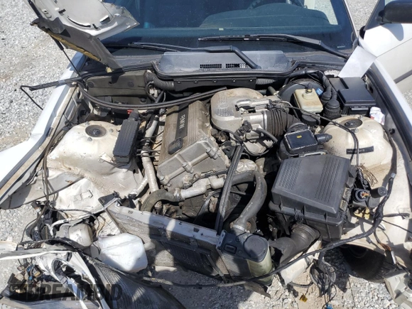 1995 BMW 3 Series 318iC with VIN WBABK6325SED18057, listed as a Copart auction lot 48123025 with 121,572 mi miles and Salvage Title. Bid and sale history available at carsss.com. Image 12.