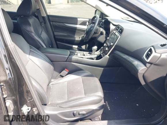 2018 Nissan Maxima SV with VIN 1N4AA6APXJC369633, listed as a IAAI auction lot 42256821 with 67,819 mi miles and . Bid and sale history available at DreamBid. Image 5.