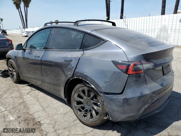 2021 Tesla Model Y Long Range with VIN 5YJYGDEEXMF070154, listed as a Copart auction lot 50742325 with 23,376 mi miles and Salvage Title. Bid and sale history available at carsss.com. Image 2.