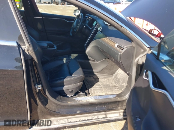 2016 Tesla Model S 90D with VIN 5YJSA1E22GF174301, listed as a IAAI auction lot 38867108 with 60,715 mi miles and . Bid and sale history available at DreamBid. Image 5.