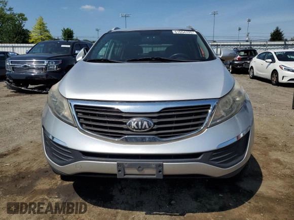 2013 Kia Sportage LX with VIN KNDPBCA24D7521374, listed as a Copart auction lot 61654725 with 146,378 mi miles and Salvage title. Bid and sale history available at DreamBid. Image 5.
