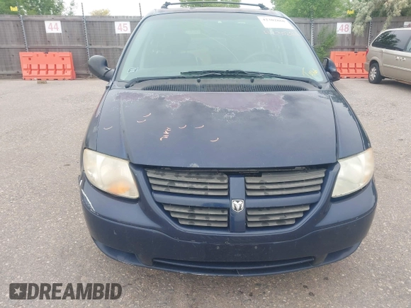 2005 Dodge Caravan SE with VIN 1D4GP24R95B420644, listed as a IAAI auction lot 42302868 with 256,701 mi miles and . Bid and sale history available at DreamBid. Image 6.