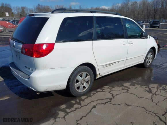 2010 Toyota Sienna CE with VIN 5TDKK4CC0AS329537, listed as a IAAI auction lot 41659723 with 258,226 mi miles. Bid and sale history available at carsss.com. Image 4.