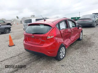 2011 Ford Fiesta SE with VIN 3FADP4EJ9BM216456, listed as a IAAI auction lot 41918530 with 165,989 mi miles. Bid and sale history available at carsss.com. Image 4.