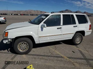 1995 Jeep Grand Cherokee Limited with VIN 1J4GZ78Y3SC701103, listed as a Copart auction lot 72038184 with 143,829 mi miles and Salvage Title. Bid and sale history available at carsss.com. Image 1.