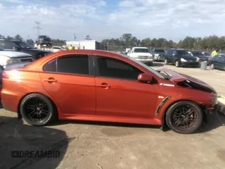 2010 Mitsubishi Lancer Evolution GSR with VIN JA32W8FV7AU003558, listed as a IAAI auction lot 40856259 with 123,639 mi miles and . Bid and sale history available at DreamBid. Image 14.