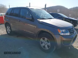 2013 Suzuki Grand Vitara Premium z VIN JS3TD0D61D4100379, wystawiony jako IAAI lot #41757205 z przebiegiem 152 692 mil mil oraz . Historia ofert i sprzedaży dostępna na DreamBid. Obrazek 1.