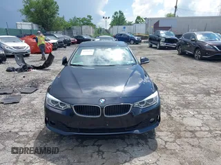 2015 BMW 4 Series 428i xDrive with VIN WBA4C9C52FD331620, listed as a IAAI auction lot 42556526 with 115,674 mi miles and . Bid and sale history available at DreamBid. Image 13.