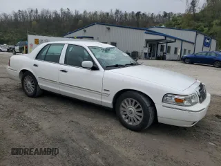 2010 Mercury Grand Marquis LS z VIN 2MEBM7FV2AX606751, wystawiony jako Copart lot #52798295 z przebiegiem 100 616 mil mil oraz Szkody całkowita. Historia ofert i sprzedaży dostępna na DreamBid. Obrazek 4.