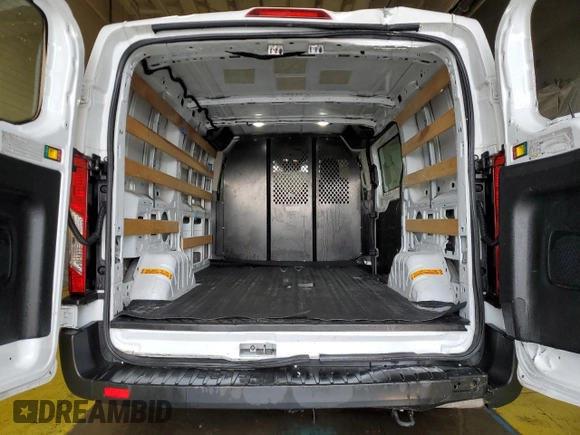 2023 Ford Transit Cargo z VIN 1FTBR1Y83PKB06391, wystawiony jako Copart lot #57686765 z przebiegiem Nie podano mil oraz Czysty tytuł • Clean title. Historia ofert i sprzedaży dostępna na DreamBid. Obrazek 10.