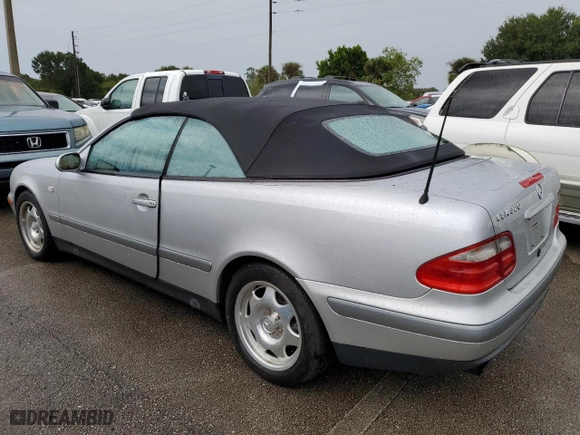 1999 Mercedes-Benz CLK-Class with VIN WDBLK65GXXT023566, listed as a Copart auction lot 73857834 with 0 mi miles and Salvage Title. Bid and sale history available at carsss.com. Image 2.