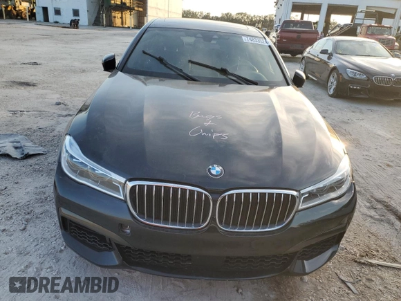 2018 BMW 7 Series 750i with VIN WBA7F0C5XJGM22674, listed as a Copart auction lot 74833524 with 0 mi miles and Salvage Title. Bid and sale history available at carsss.com. Image 5.