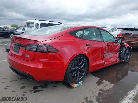 2022 Tesla Model S Plaid with VIN 5YJSA1E61NF485055, listed as a IAAI auction lot 41751134 with 1 mi miles. Bid and sale history available at carsss.com. Image 4.