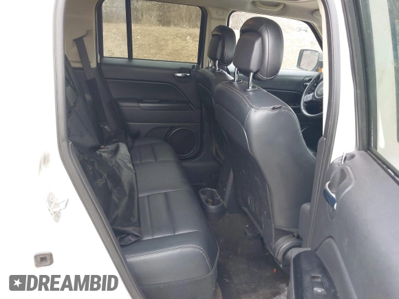 2016 Jeep Patriot Latitude with VIN 1C4NJRFBXGD627551, listed as a IAAI auction lot 41716065 with 140,000 mi miles. Bid and sale history available at carsss.com. Image 8.