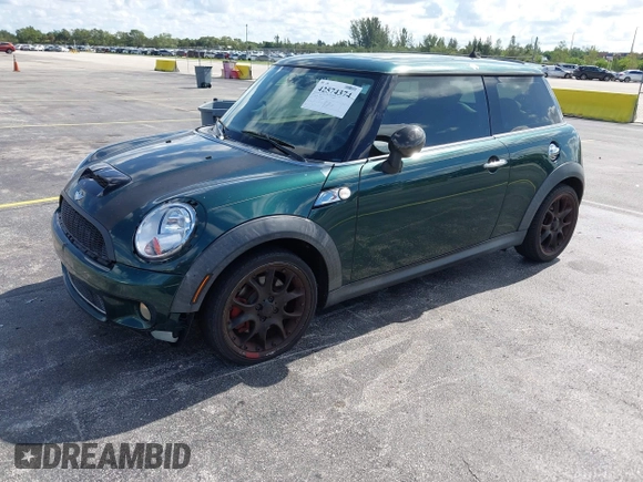 2007 MINI Hardtop S with VIN WMWMF73507TV30183, listed as a IAAI auction lot 42574374 with 90,334 mi miles and . Bid and sale history available at DreamBid. Image 2.