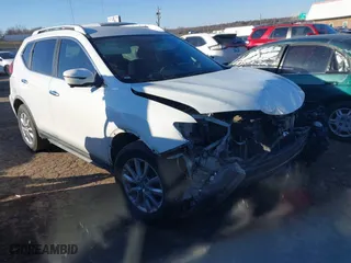 2017 Nissan Rogue S with VIN KNMAT2MTXHP612673, listed as a IAAI auction lot 41332703 with 87,596 mi miles. Bid and sale history available at carsss.com. Image 1.
