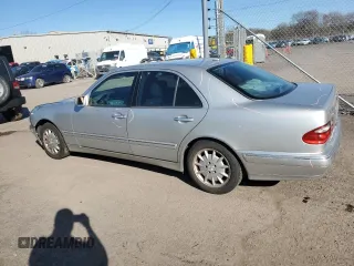 2002 Mercedes-Benz E-Class with VIN WDBJF82JX2X071254, listed as a Copart auction lot 50179635 with 126,870 mi miles and Salvage Title. Bid and sale history available at carsss.com. Image 2.