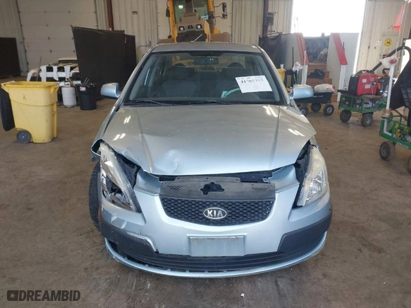 2009 Kia Rio with VIN KNADE223X96512538, listed as a IAAI auction lot 41765393 with NaN miles. Bid and sale history available at carsss.com. Image 12.