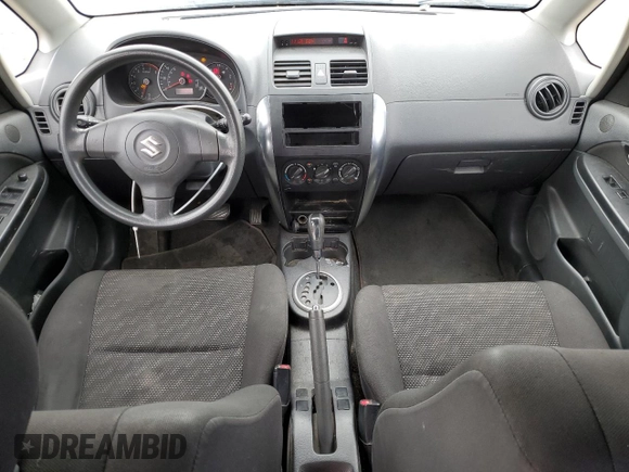 2008 Suzuki SX4 Regional Edition z VIN JS2YA413785101766, wystawiony jako Copart lot #71889774 z przebiegiem 94 215 mil mil oraz Szkoda całkowita • Salvage title. Historia ofert i sprzedaży dostępna na DreamBid. Obrazek 8.