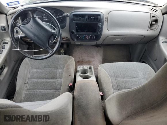 1999 Ford Explorer with VIN 1FMYU22E1XUA94061, listed as a Copart auction lot 44463165 with 172,246 mi miles and Salvage title. Bid and sale history available at DreamBid. Image 10.