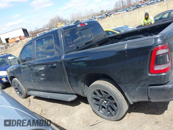 2023 Ram 1500 Laramie with VIN 1C6SRFJT6PN542105, listed as a IAAI auction lot 41974428 with 74,489 mi miles and . Bid and sale history available at DreamBid. Image 14.