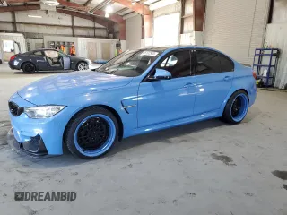 2015 BMW M3 with VIN WBS3C9C59FP804130, listed as a Copart auction lot 65192563 with 67,939 mi miles. Bid and sale history available at carsss.com. Image 1.