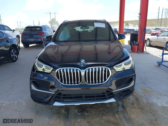 2021 BMW X1 sDrive28i with VIN WBXJG7C02M5S59010, listed as a IAAI auction lot 41933532 with 49,207 mi miles. Bid and sale history available at carsss.com. Image 12.