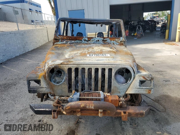 1999 Jeep Wrangler Sport with VIN 1J4FY19S3XP468927, listed as a Copart auction lot 64190184 with 0 mi miles and Non Repairable. Bid and sale history available at carsss.com. Image 5.