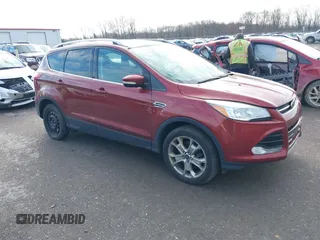 2015 Ford Escape Titanium with VIN 1FMCU9J91FUA26624, listed as a IAAI auction lot 40854175 with 132,313 mi miles. Bid and sale history available at carsss.com. Image 1.