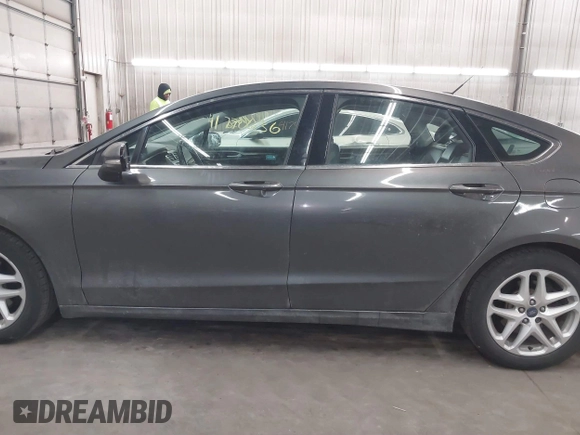 2015 Ford Fusion SE z VIN 3FA6P0HD0FR132316, wystawiony jako IAAI lot #41770636 z przebiegiem 185 681 mil mil oraz . Historia ofert i sprzedaży dostępna na DreamBid. Obrazek 14.