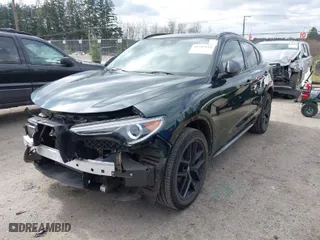 2020 Alfa Romeo Stelvio Ti with VIN ZASPAKBNXL7C75314, listed as a IAAI auction lot 41742922 with 34,620 mi miles. Bid and sale history available at carsss.com. Image 2.