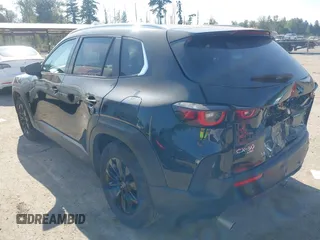 2025 Mazda CX-50 S Preferred with VIN 7MMVABBM9SN301063, listed as a IAAI auction lot 42801040 with 23,696 mi miles and . Bid and sale history available at DreamBid. Image 3.