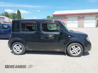 2014 Nissan Cube SL z VIN JN8AZ2KR3ET351190, wystawiony jako IAAI lot #42365065 z przebiegiem 164 703 mil mil oraz . Historia ofert i sprzedaży dostępna na DreamBid. Obrazek 14.