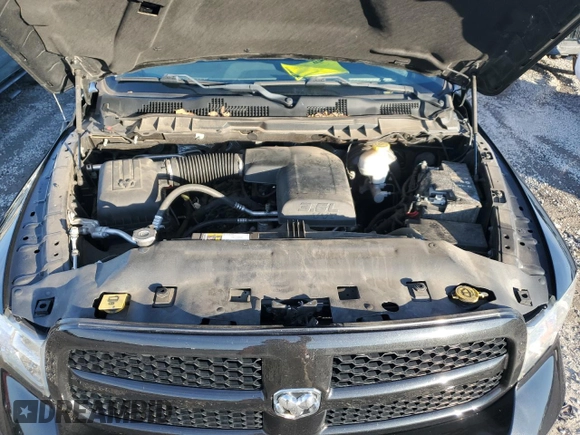 2018 Ram 1500 Express z VIN 3C6RR7KG3JG203310, wystawiony jako Copart lot #82222274 z przebiegiem 84 017 mil mil oraz Szkoda całkowita • Salvage title. Historia ofert i sprzedaży dostępna na DreamBid. Obrazek 11.