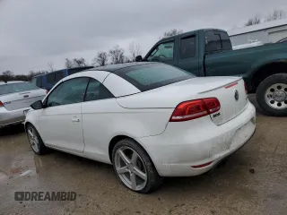 2013 Volkswagen Eos Komfort with VIN WVWBW8AH5DV001888, listed as a Copart auction lot 86886554 with 188,812 mi miles and Salvage Title. Bid and sale history available at DreamBid. Image 2.