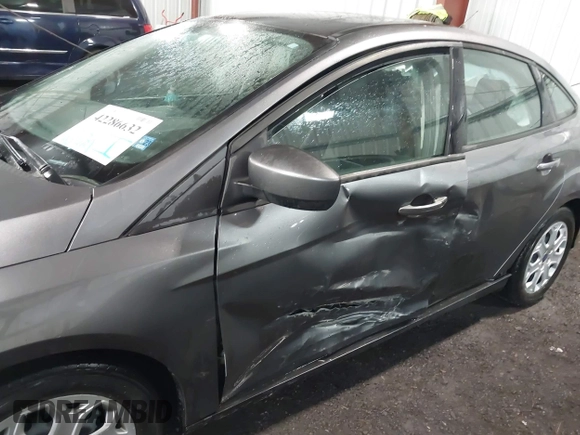 2012 Ford Focus SE with VIN 1FAHP3F21CL408430, listed as a IAAI auction lot 42286632 with 140,387 mi miles and . Bid and sale history available at DreamBid. Image 6.