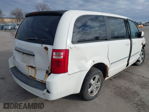 2008 Dodge Grand Caravan SXT with VIN 2D8HN54P08R697925, listed as a IAAI auction lot 41249716 with 176,439 mi miles and . Bid and sale history available at DreamBid. Image 4.