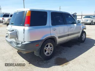 1999 Honda CR-V EX with VIN JHLRD1861XC025446, listed as a IAAI auction lot 41852155 with 201,598 mi miles. Bid and sale history available at carsss.com. Image 4.
